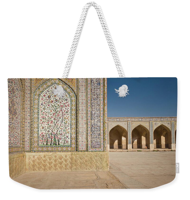 Tranquility Weekender Tote Bag featuring the photograph In The Courtyard Of Vakil Mosque In by Jean-philippe Tournut