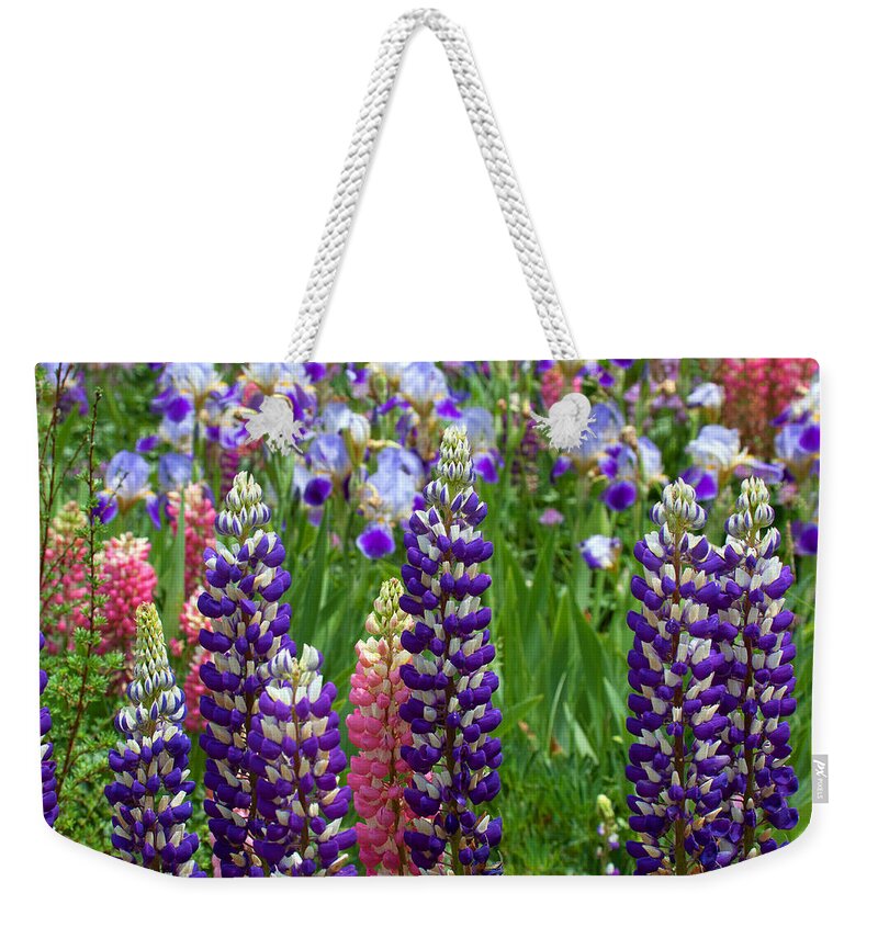 Flowers Photograph; Lupine Canvas Print Weekender Tote Bag featuring the photograph Below the Evergreen Dam by Jim Garrison