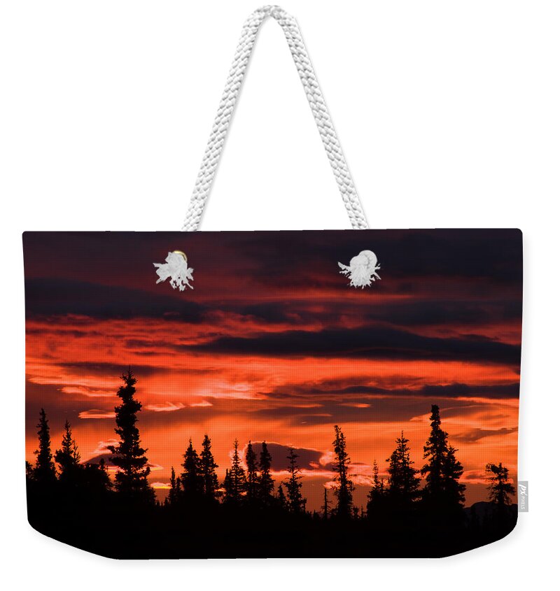Sunrise Photography Weekender Tote Bag featuring the photograph Incredible red clouds over Denali by Jeff Folger