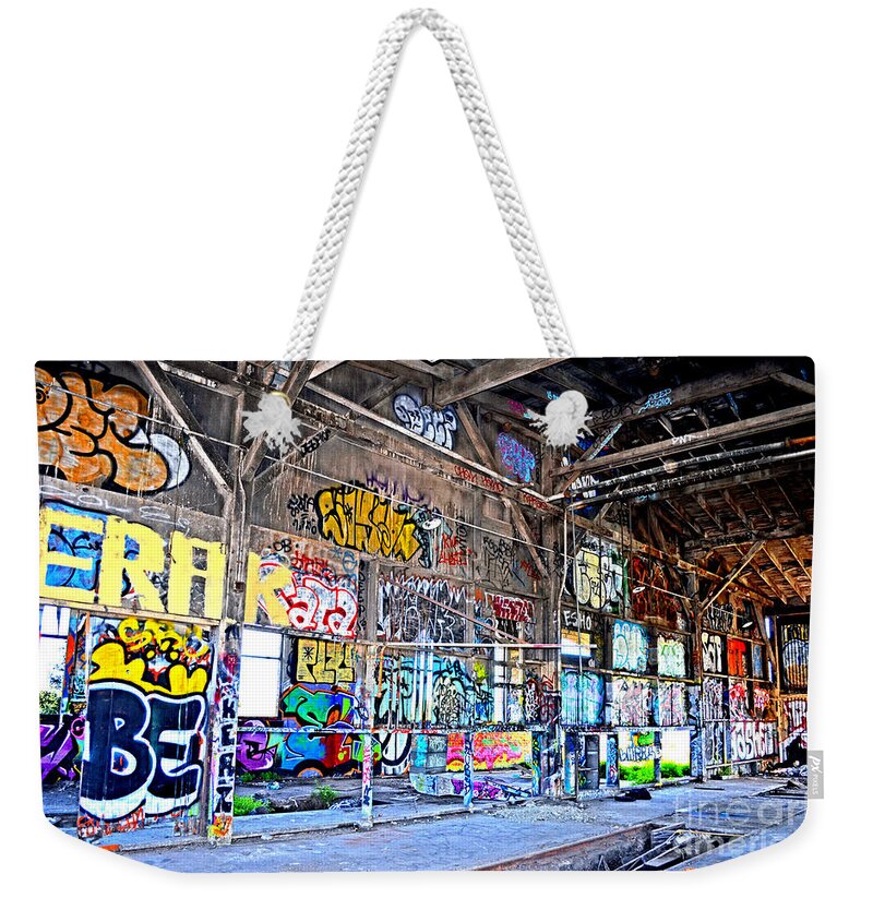Destroyed Weekender Tote Bag featuring the photograph Inside The Old Train Roundhouse at Bayshore near San Francisco and the Cow Palace V by Jim Fitzpatrick