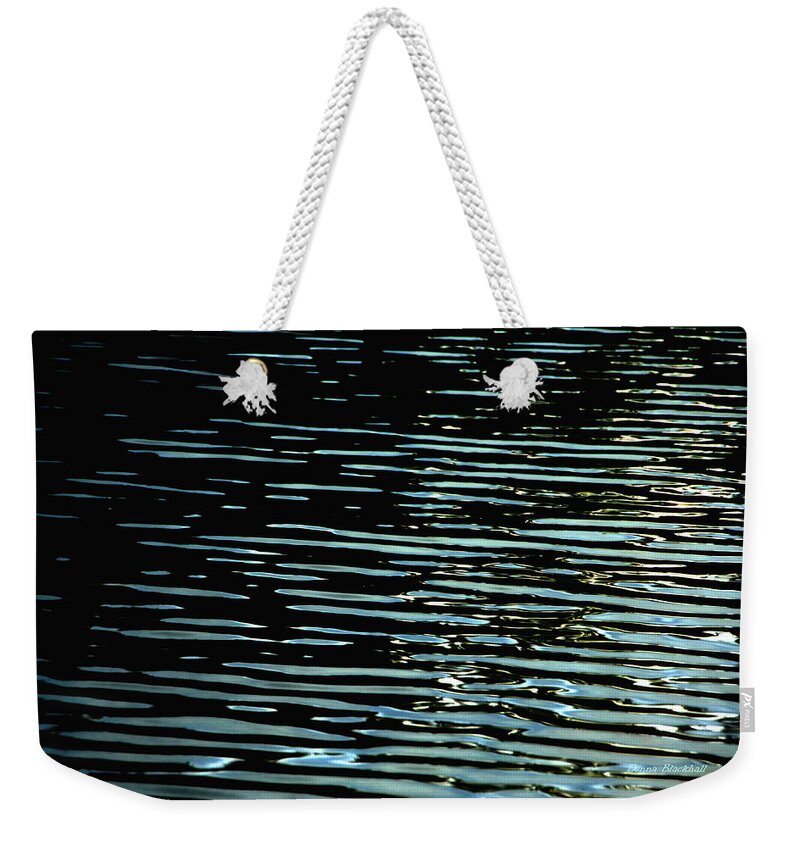 Abstract Water Reflection Weekender Tote Bag featuring the photograph Intensity by Donna Blackhall