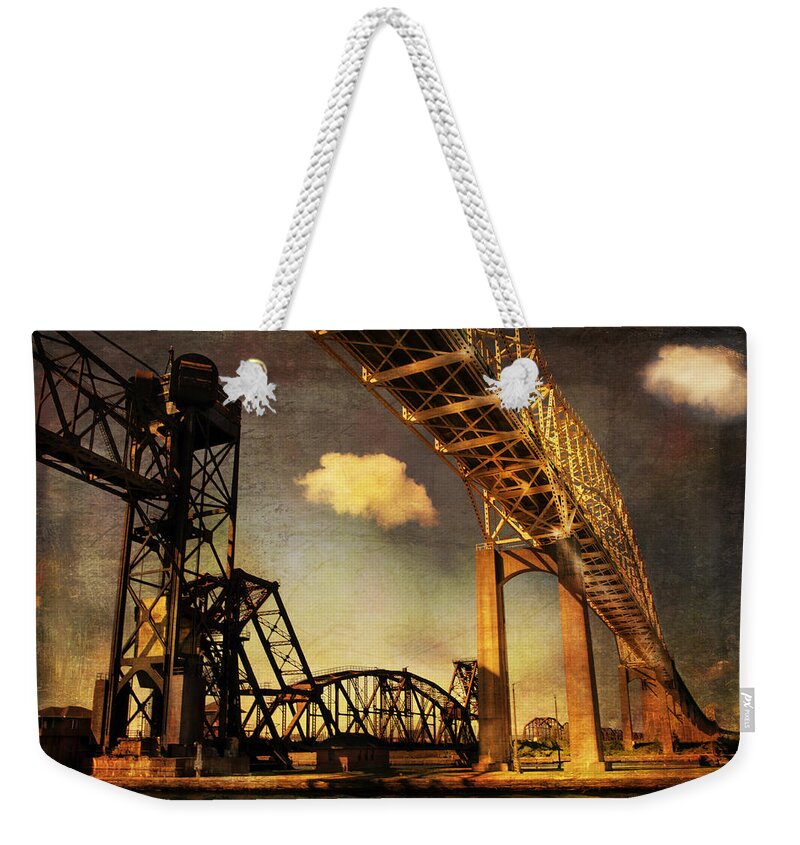 Evie Weekender Tote Bag featuring the photograph International Bridge to Canada by Evie Carrier