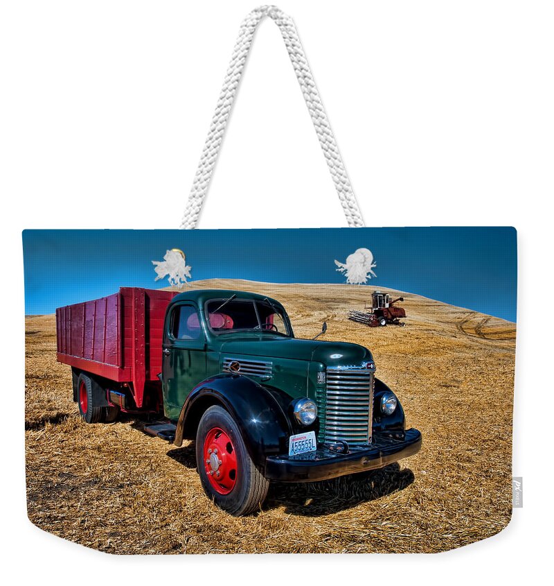 International Weekender Tote Bag featuring the photograph International Farm Truck by Paul DeRocker