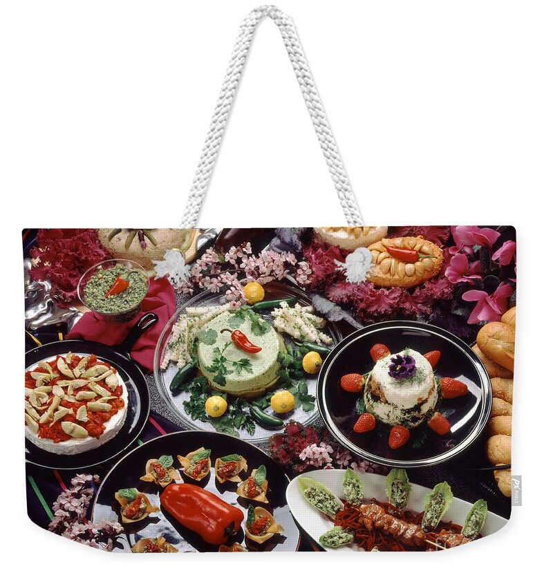 Craig Lovell Weekender Tote Bag featuring the photograph International Hors Doeuvres by Craig Lovell