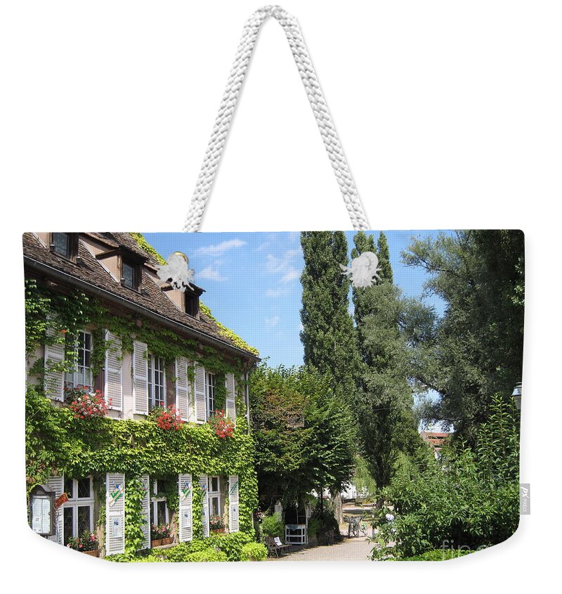Timber Weekender Tote Bag featuring the photograph Ivy covered house in Strasbourg France by Amanda Mohler