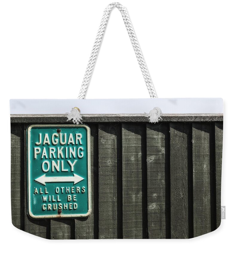 Sign Weekender Tote Bag featuring the photograph Jaguar car park by Joana Kruse