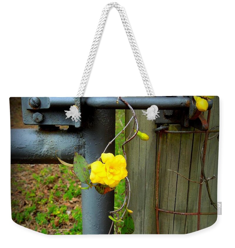 Funky Weekender Tote Bag featuring the photograph Jasmine Flowers on Gate Latch by Renee Trenholm