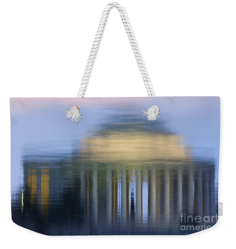 Clarence Holmes Weekender Tote Bag featuring the photograph Jefferson Memorial Reflection by Clarence Holmes