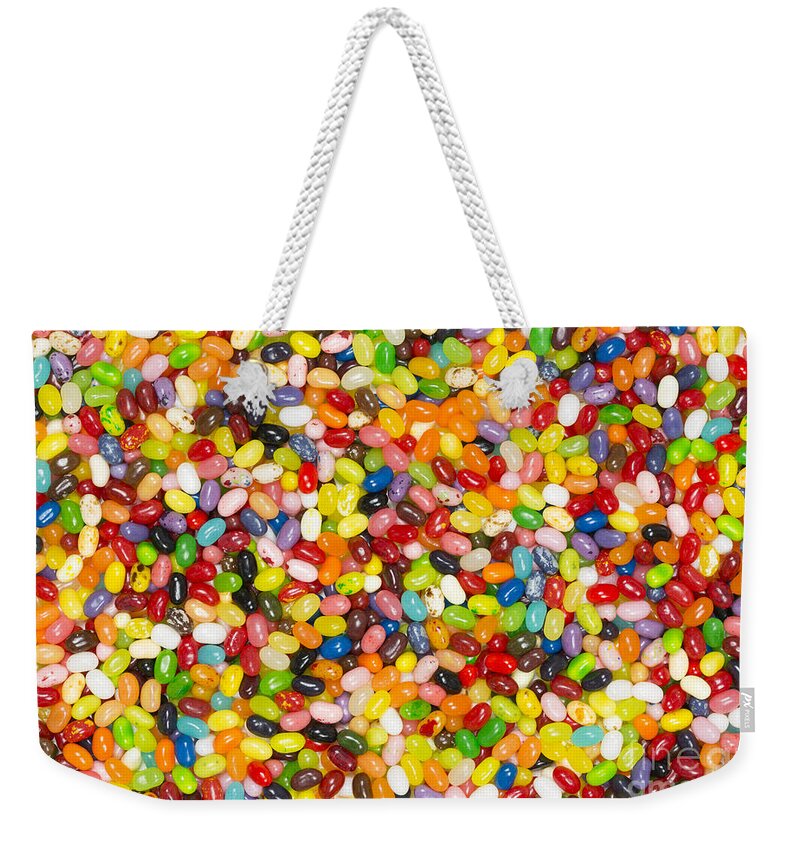 Jelly Bean Weekender Tote Bag featuring the photograph Jelly beans background by Ken Brown