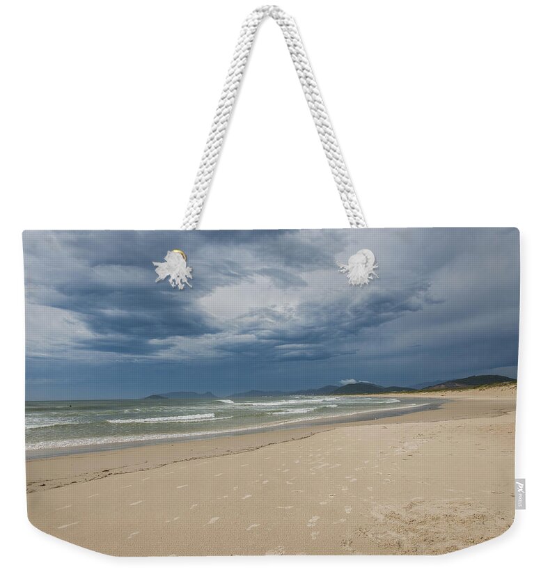 Tranquility Weekender Tote Bag featuring the photograph Joaquina Beach by Maremagnum