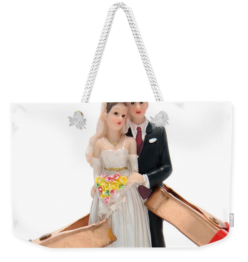 Married Weekender Tote Bag featuring the photograph Jump Starting the Romance by Olivier Le Queinec