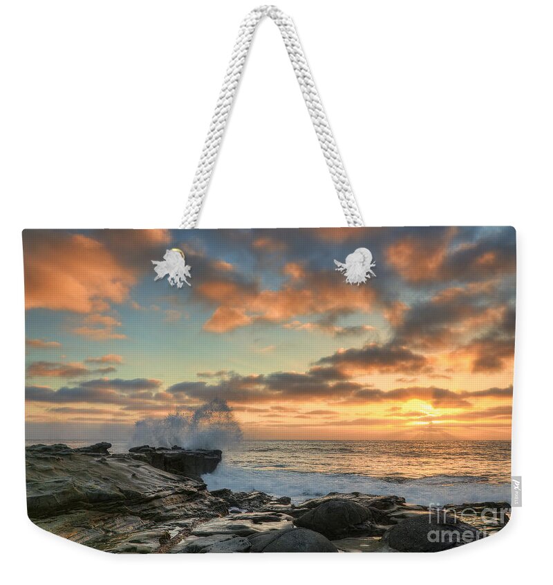 La Jolla Weekender Tote Bag featuring the photograph La Jolla Cove At Sunset by Eddie Yerkish
