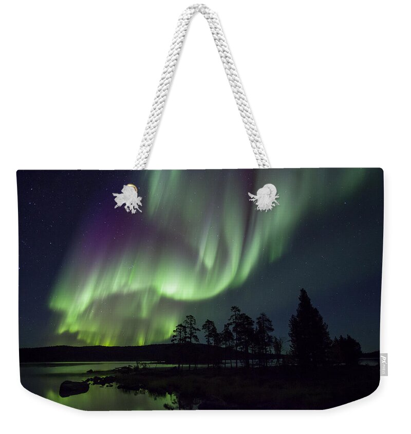 Heike Odermatt Weekender Tote Bag featuring the photograph Lake And Aurora Borealis Lake Inari by Heike Odermatt