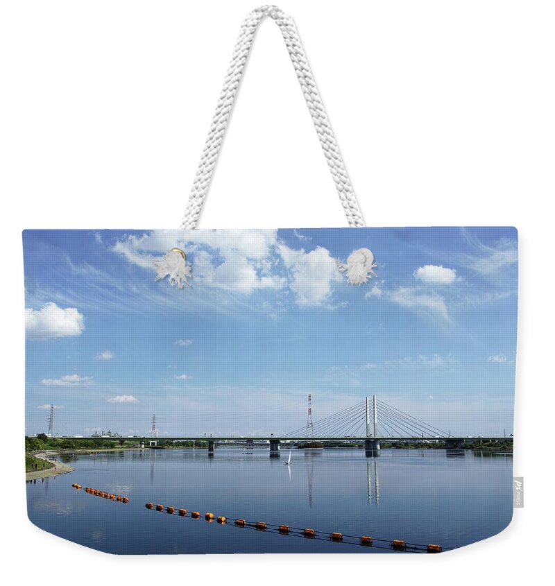 Tranquility Weekender Tote Bag featuring the photograph Lake And Cable-stayed Bridge by Huzu1959
