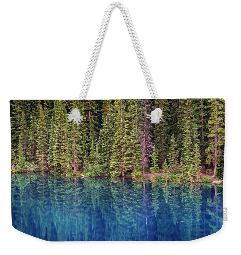 Tranquility Weekender Tote Bag featuring the photograph Lake Moraine, Banff National by Ignacio Palacios
