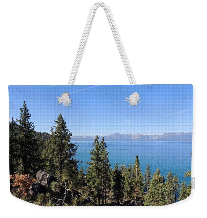 Lake Tahoe Weekender Tote Bag featuring the photograph Lake Tahoe Through the Trees by Jayne Wilson