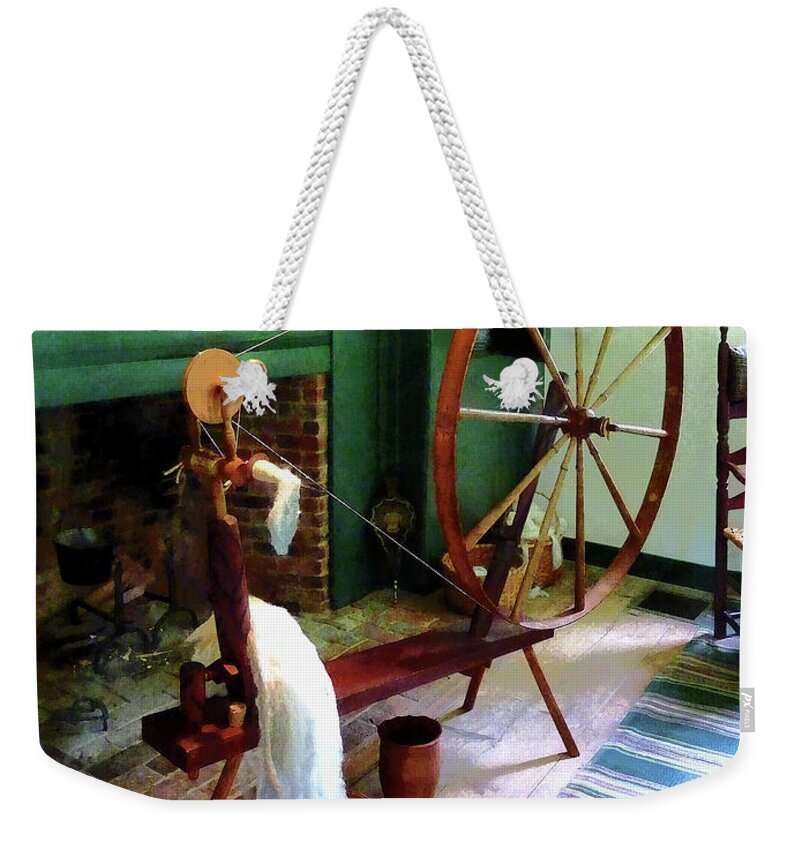 Spinning Wheel Weekender Tote Bag featuring the photograph Large Spinning Wheel by Susan Savad