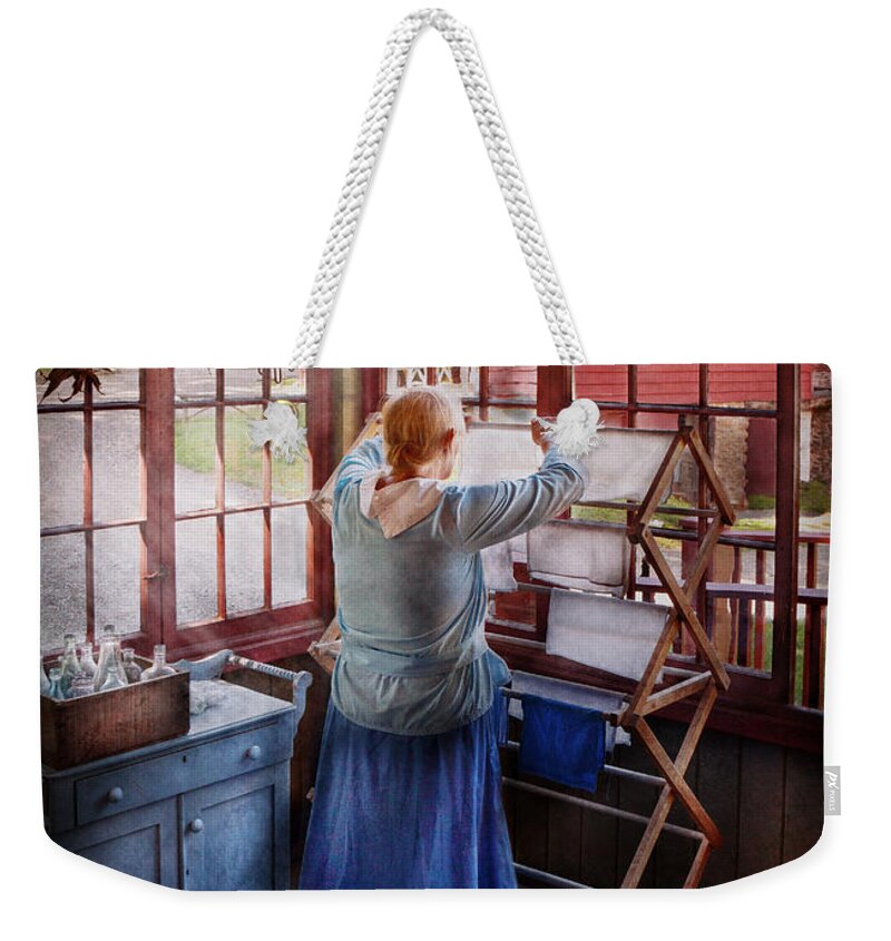 Miss Lady Blue Weekender Tote Bag featuring the photograph Laundry - Miss Lady Blue by Mike Savad