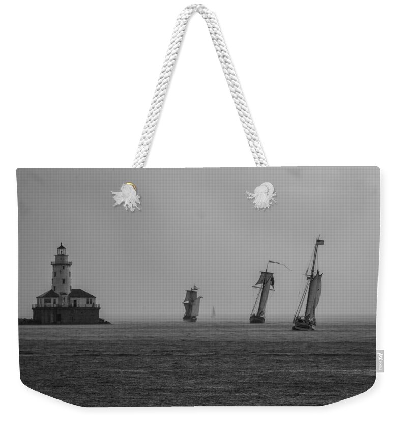  Weekender Tote Bag featuring the photograph Lean by Sue Conwell