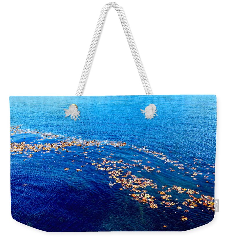 Leaves On The Ocean Weekender Tote Bag featuring the photograph Leaves on the Ocean by Sharon Talson