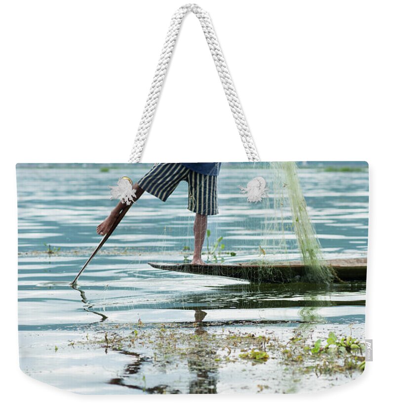 Straw Hat Weekender Tote Bag featuring the photograph Leg-rowing Fisherman, Inle Lake, Shan by Cultura Rm Exclusive/yellowdog
