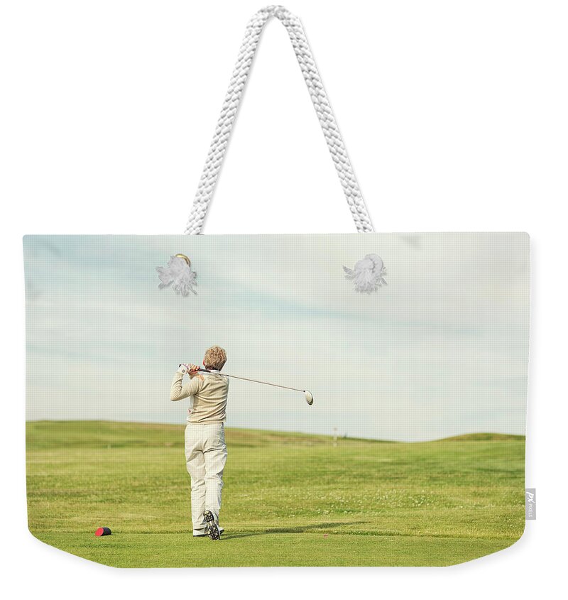 Mature Adult Weekender Tote Bag featuring the photograph Leisure Game by Richvintage