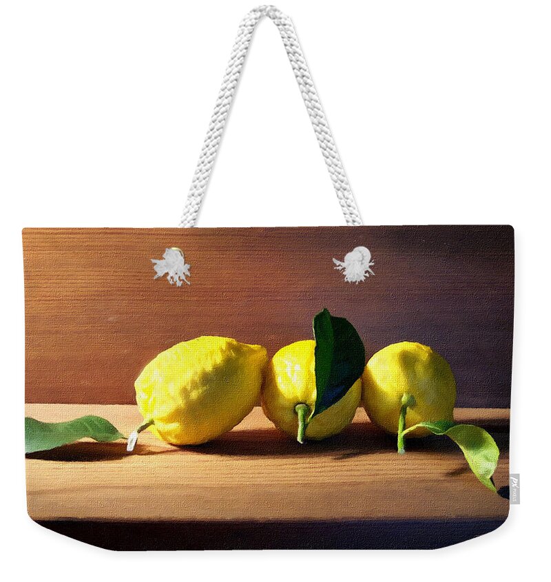 Lemons Weekender Tote Bag featuring the photograph Lemons by Frank Wilson