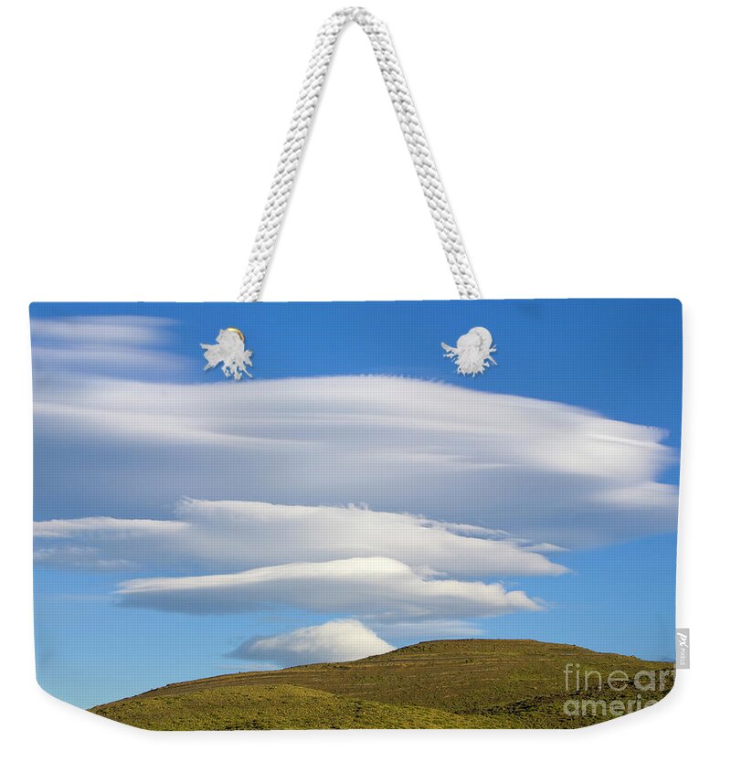 00346037 Weekender Tote Bag featuring the photograph Lenticular Clouds Over Torres Del Paine by Yva Momatiuk John Eastcott