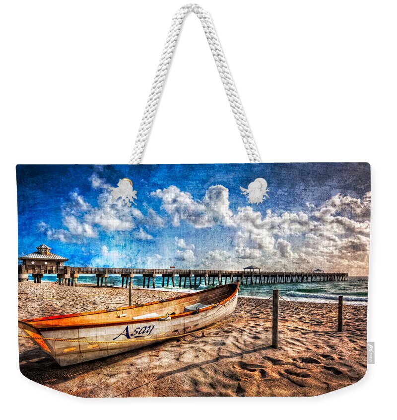 Boats Weekender Tote Bag featuring the photograph Lifeguard Boat by Debra and Dave Vanderlaan