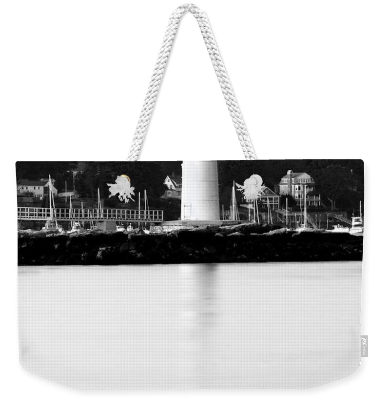 Lighthouse Weekender Tote Bag featuring the photograph Light Reflection by Greg Fortier