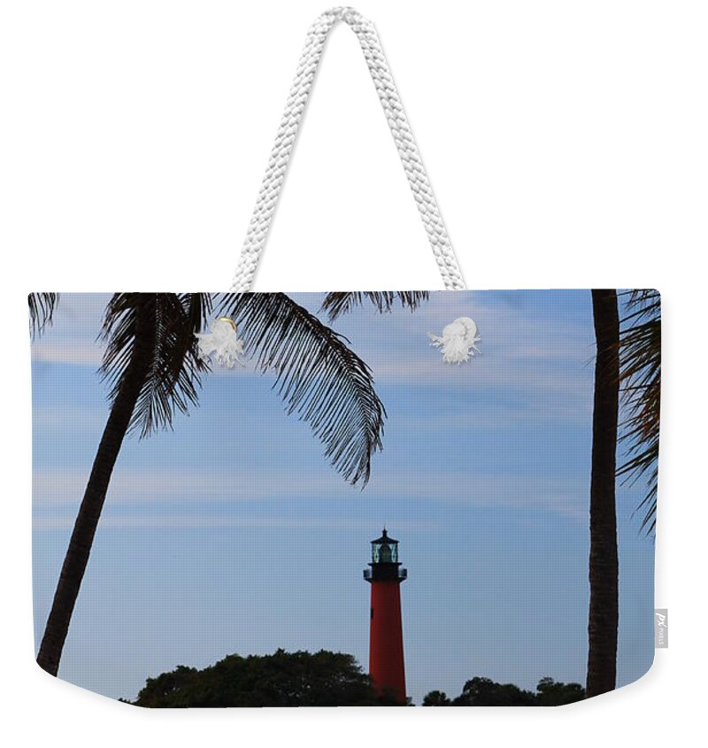Jupiter Weekender Tote Bag featuring the photograph Lighthouse from afar by Catie Canetti