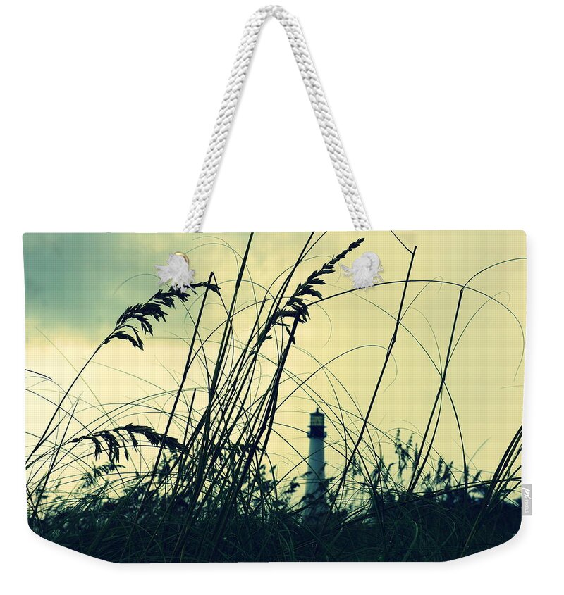 Lighthouse Weekender Tote Bag featuring the photograph Lighthouse in the distance by Laurie Perry