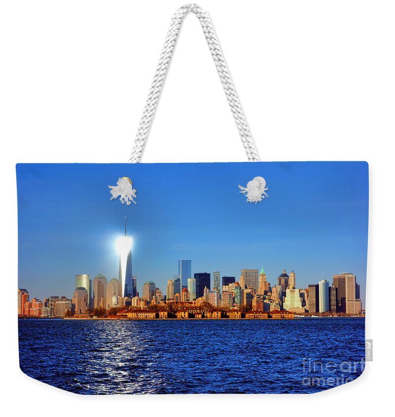 New Weekender Tote Bag featuring the photograph Lighthouse Manhattan by Olivier Le Queinec