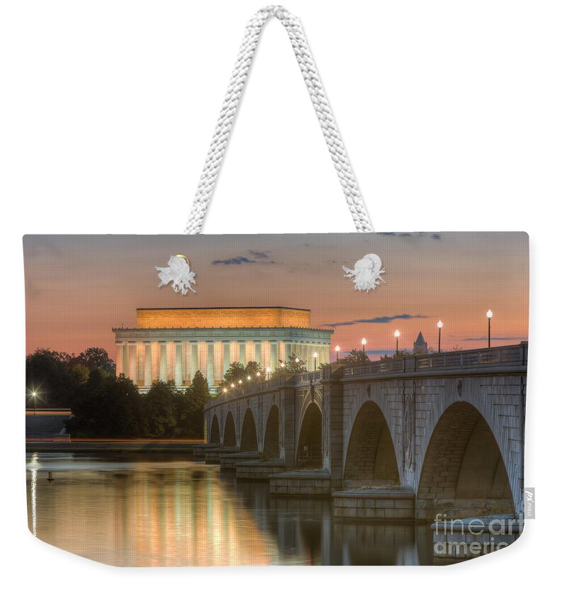 Clarence Holmes Weekender Tote Bag featuring the photograph Lincoln Memorial and Arlington Memorial Bridge at Dawn I by Clarence Holmes