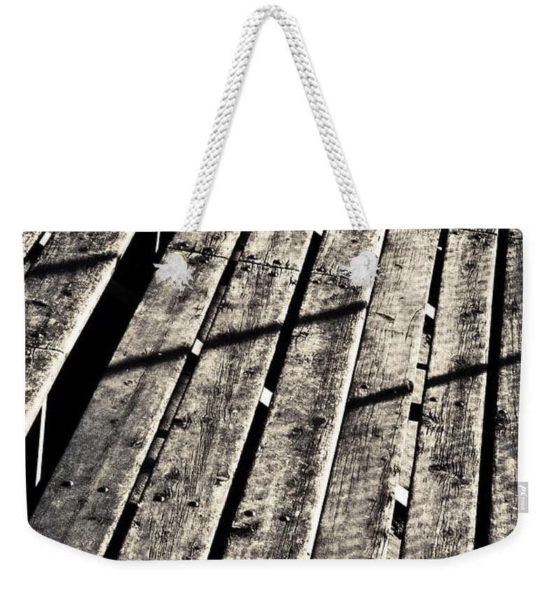 Bleachers Weekender Tote Bag featuring the photograph Lines by Caitlyn Grasso