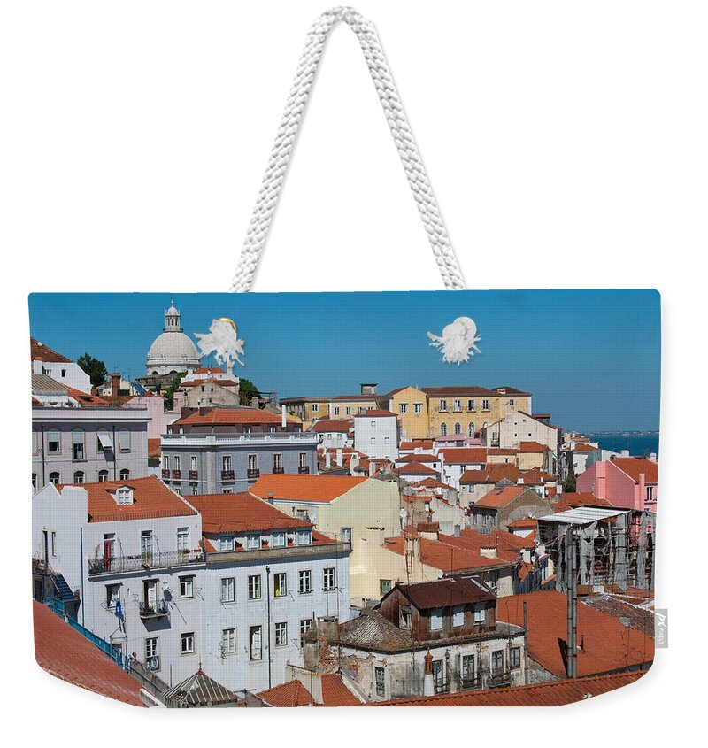 Lisbon Weekender Tote Bag featuring the photograph Lisbon Alfama District by Cascade Colors