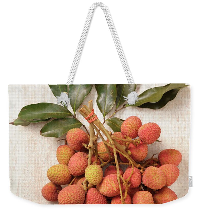 Hanging Weekender Tote Bag featuring the photograph Litchi by Riou