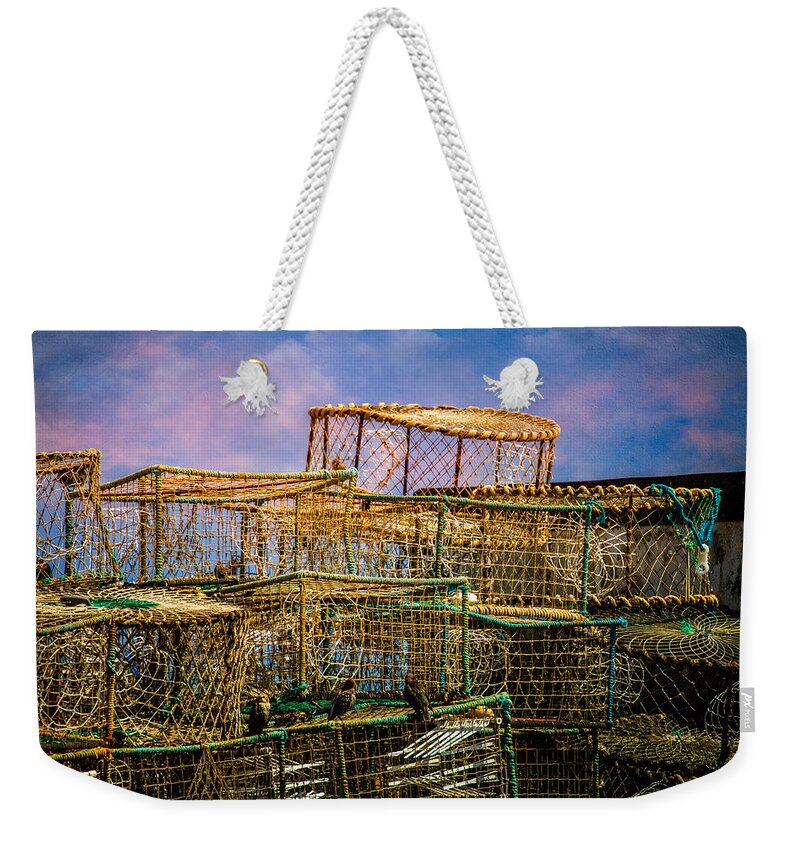 Eastbourne Weekender Tote Bag featuring the photograph Lobster Baskets and Starlings by Chris Lord