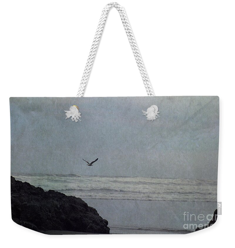 Lone Gull Weekender Tote Bag featuring the photograph Lone Gull by Sharon Elliott