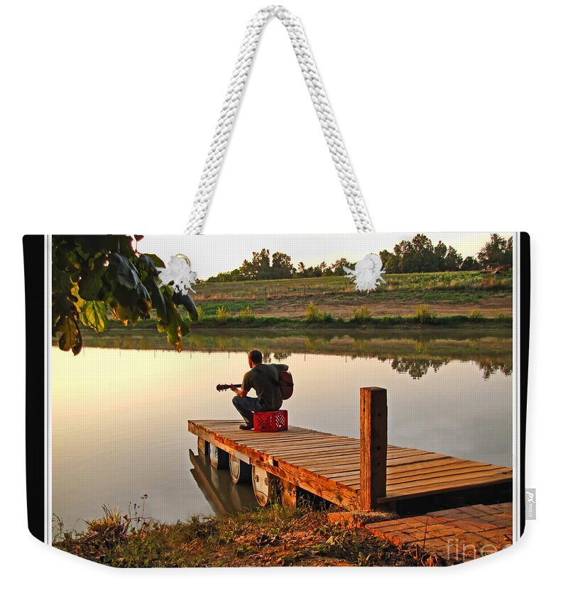 Musician Weekender Tote Bag featuring the photograph Lonely Guitarist by Debbie Portwood