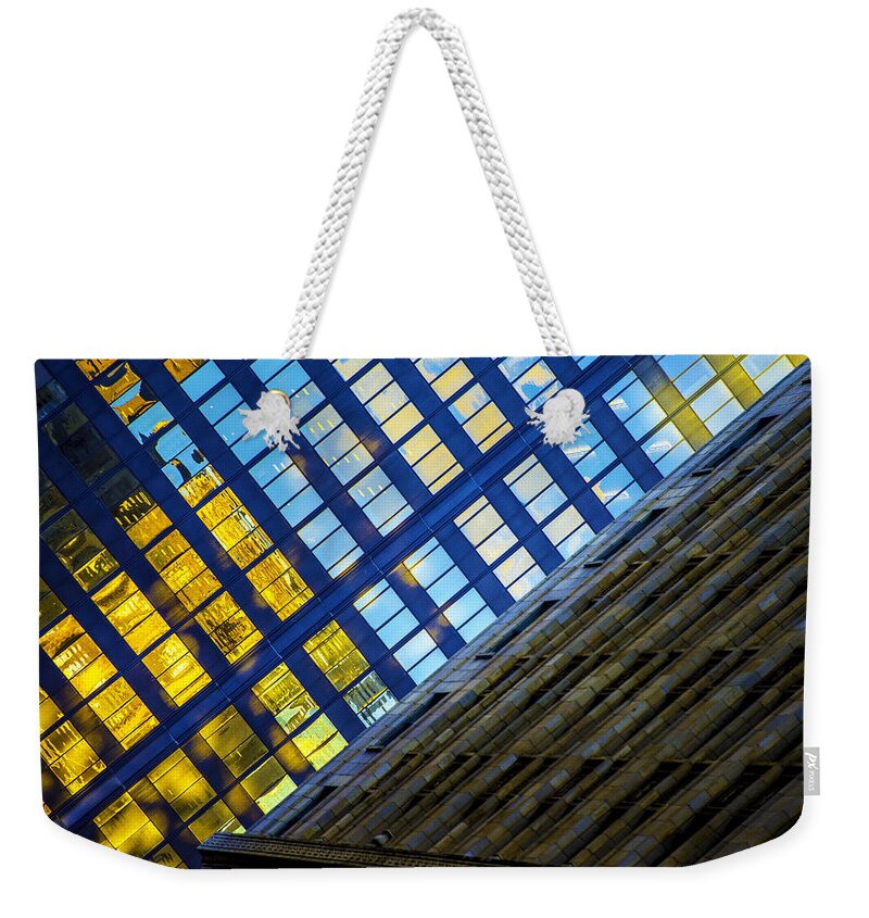  Weekender Tote Bag featuring the photograph Loner by Raymond Kunst