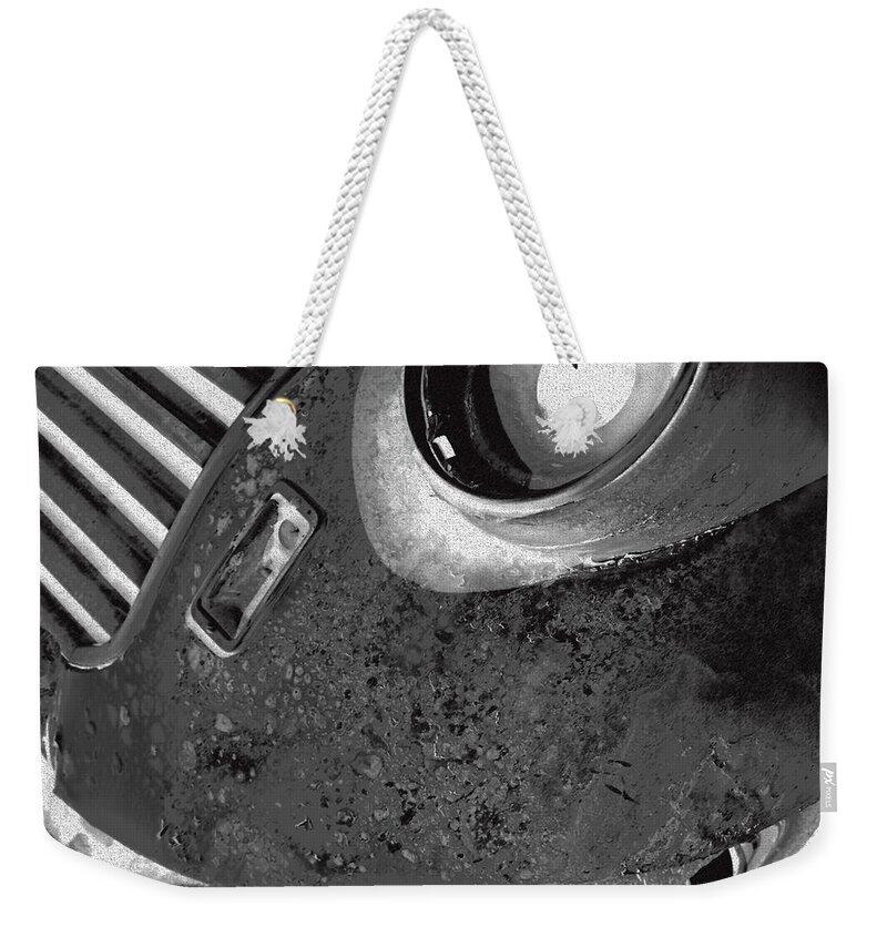 Headlight Weekender Tote Bag featuring the photograph Lost Headlight BW by Cathy Anderson