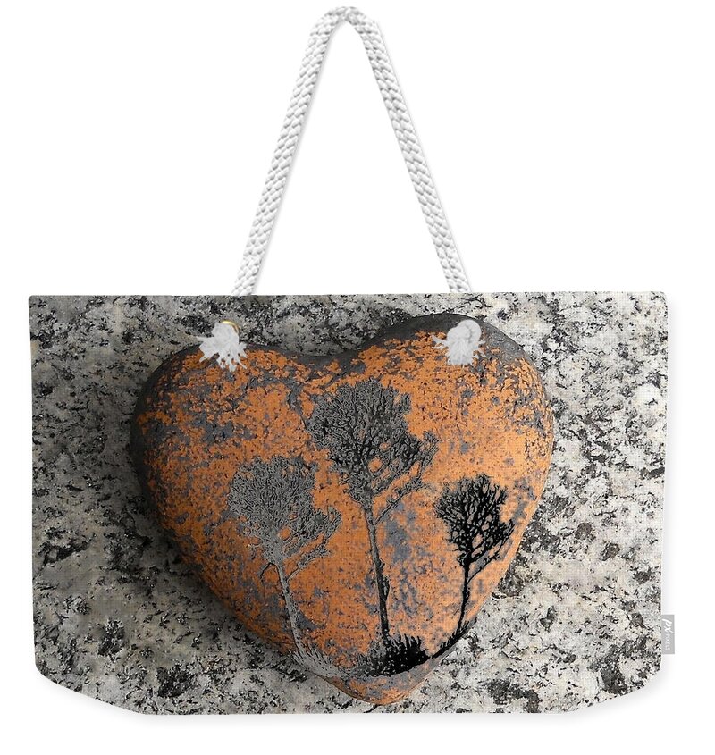 Love Weekender Tote Bag featuring the photograph Lost Heart by Juergen Weiss