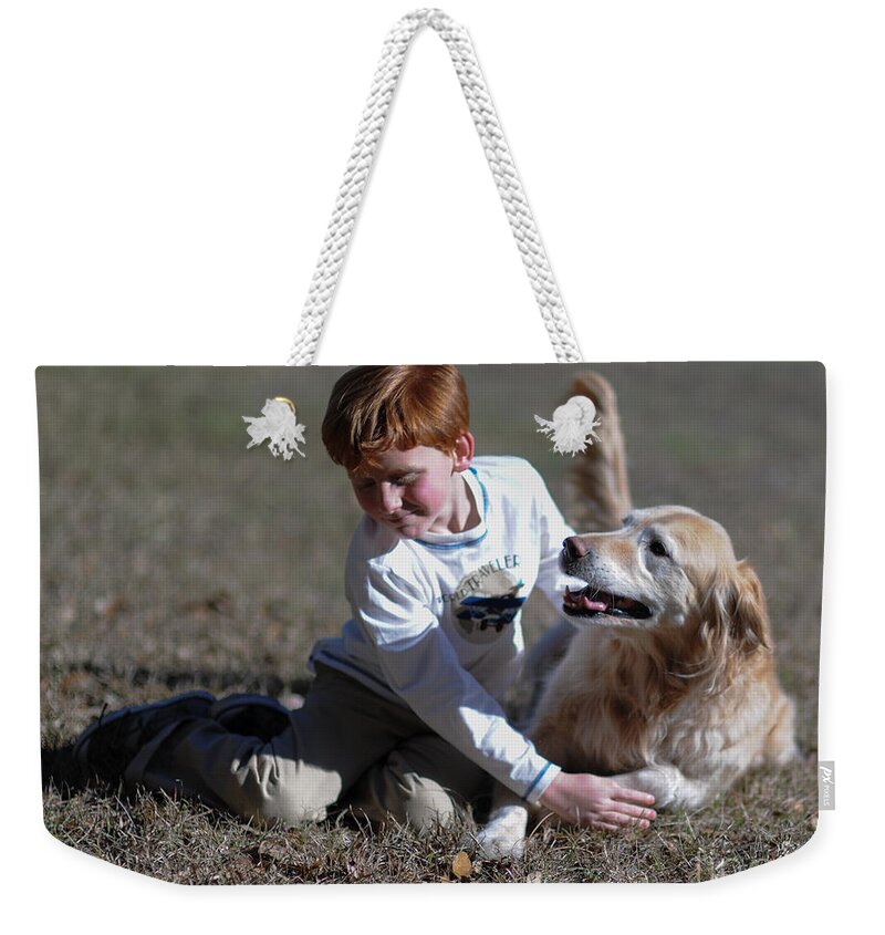 Boy Weekender Tote Bag featuring the photograph Love of a Dog by Dale Powell