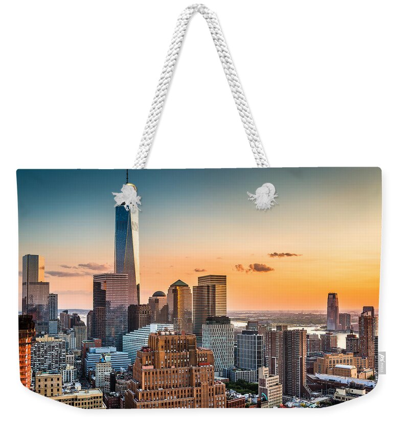 Broadway Weekender Tote Bag featuring the photograph Lower Manhattan at sunset by Mihai Andritoiu