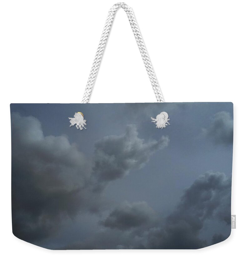 Sky Weekender Tote Bag featuring the photograph Lullaby by Chris Dunn