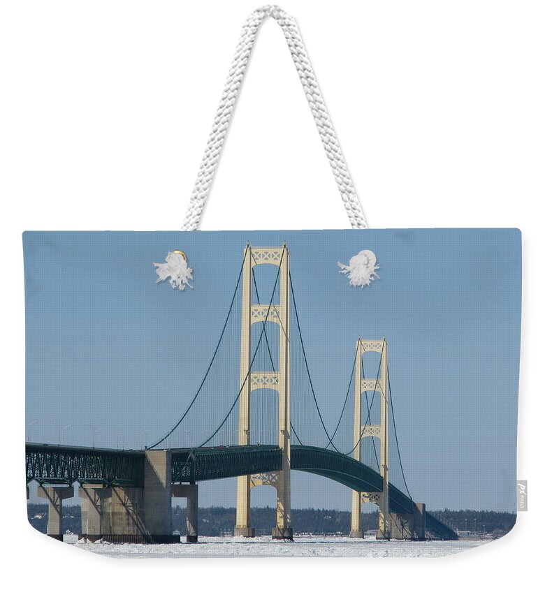 Mackinac Bridge Weekender Tote Bag featuring the photograph Mackinac Bridge in Winter by Keith Stokes