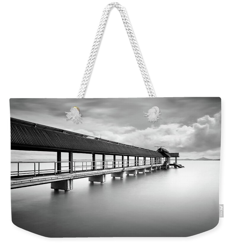 Tranquility Weekender Tote Bag featuring the photograph Main Jetty by Photography By Azrudin