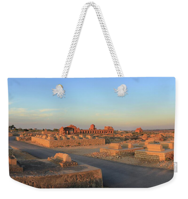 Tranquility Weekender Tote Bag featuring the photograph Makli Graveyard by Iqbal Khatri