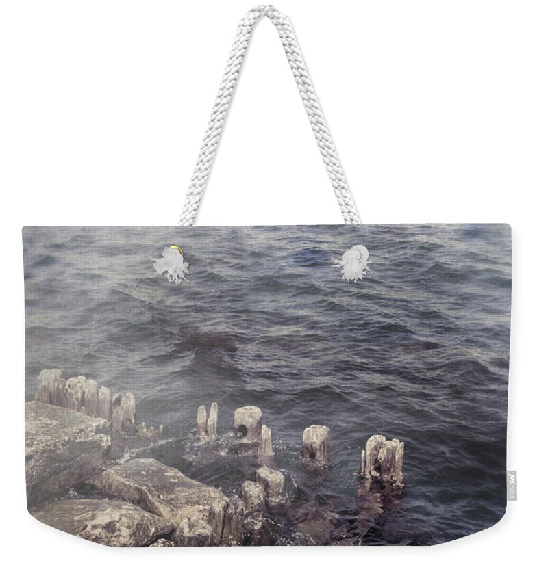 Man Weekender Tote Bag featuring the photograph Man in Row Boat on Foggy Sea by Jill Battaglia